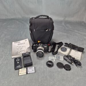 Pentax Q Mirrorless Interchangeaable Digital Camera w/02 5-15mm f/2.8-4.5 Lens
